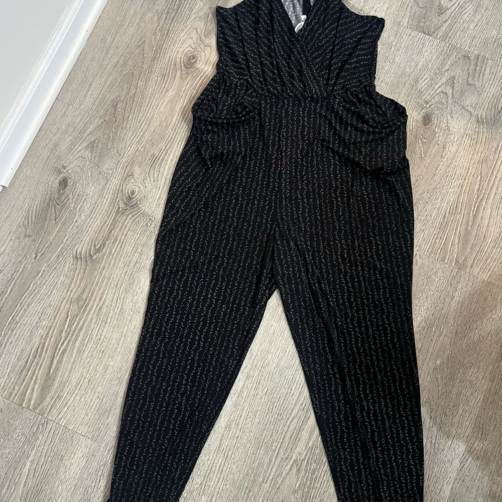 BCBGeneration Black Jumpsuit with V-neckline and Slim Fit